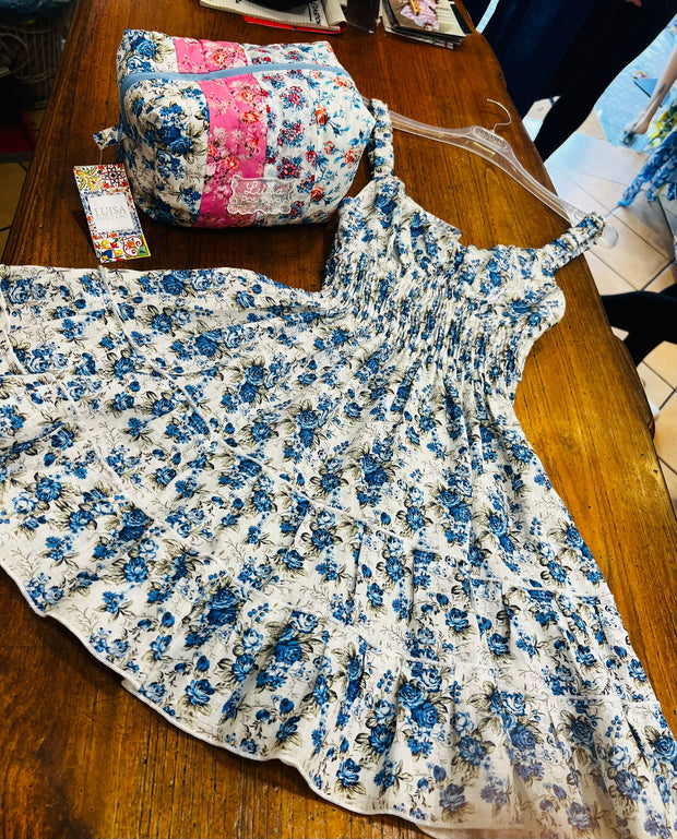 Mini flowery blue dress and beauty case